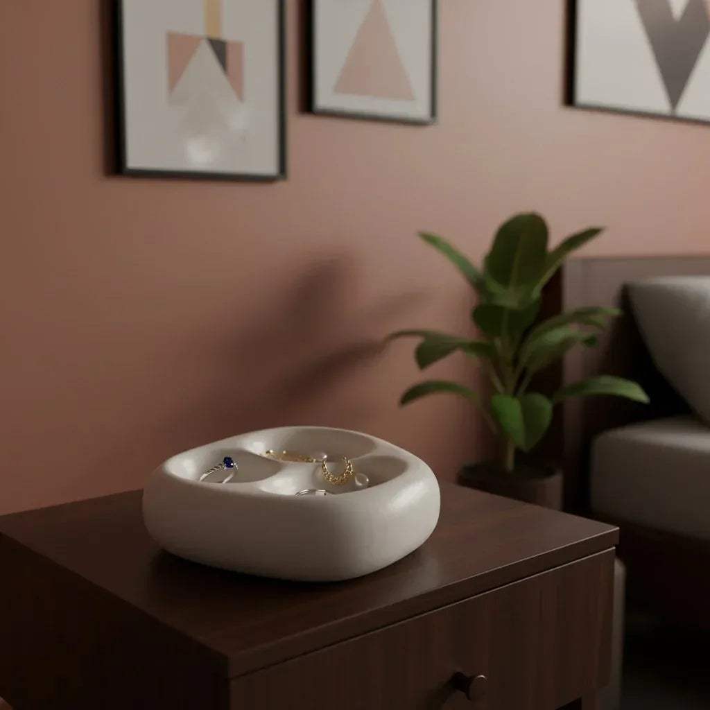 Aesthetic bedside jewelry organizer; side view of the river stone trinket tray.