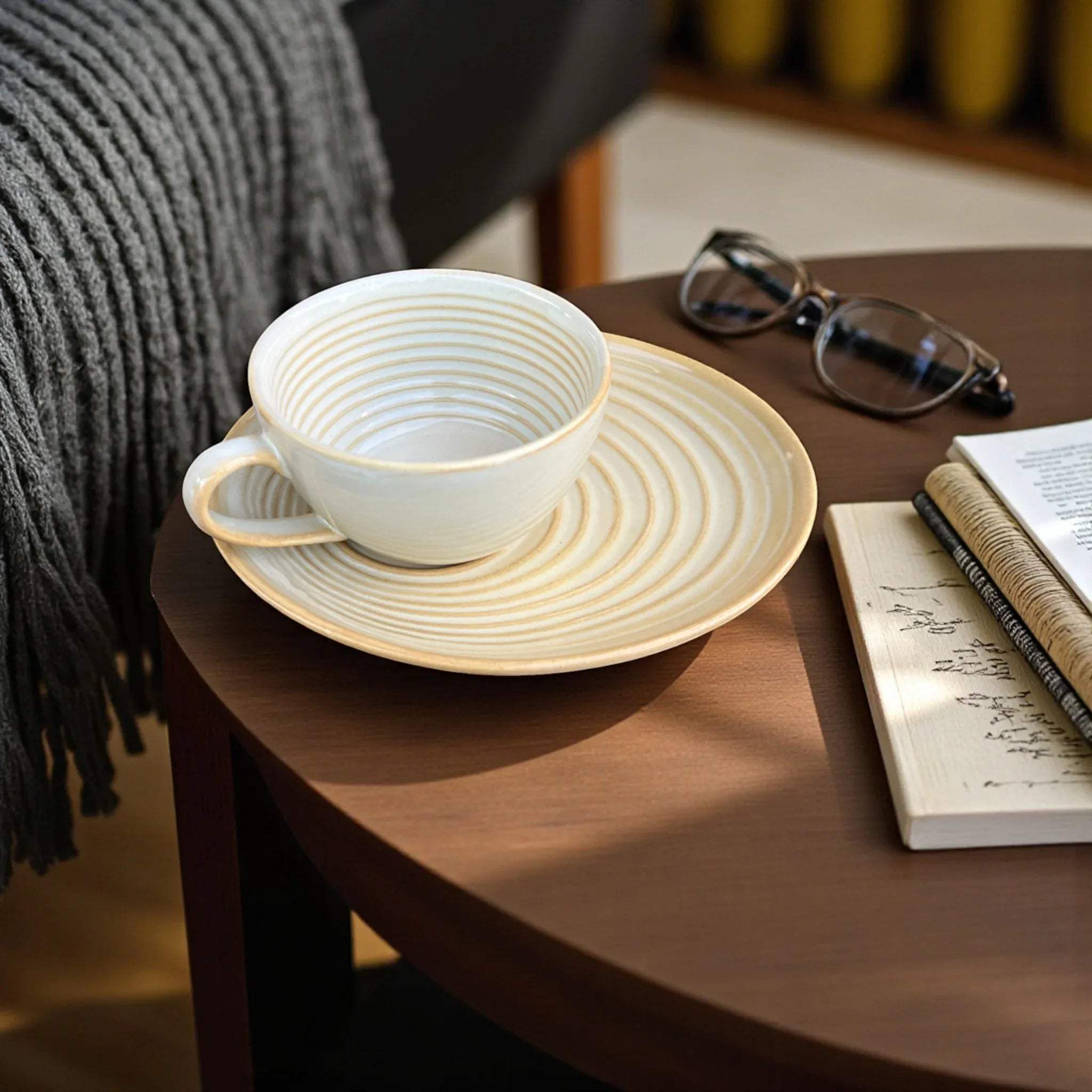 Warm yellow glaze texture; handcrafted pottery rim and artisanal ceramic finish for luxury mood boards.