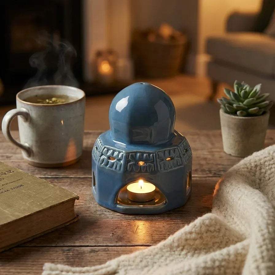 Evening ambiance; the dome glowing on a dark wood coffee table during a quiet, cozy night in.