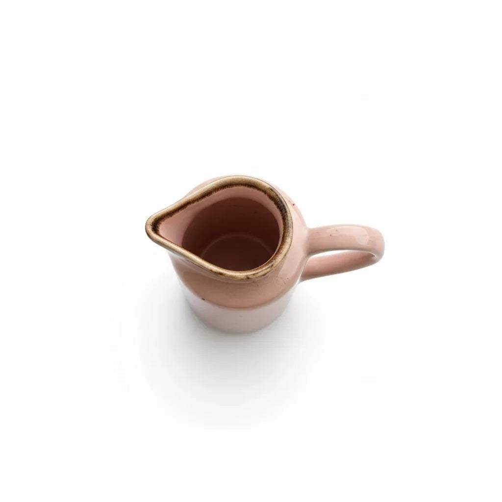 Top view of the blush pink glossy creamer.