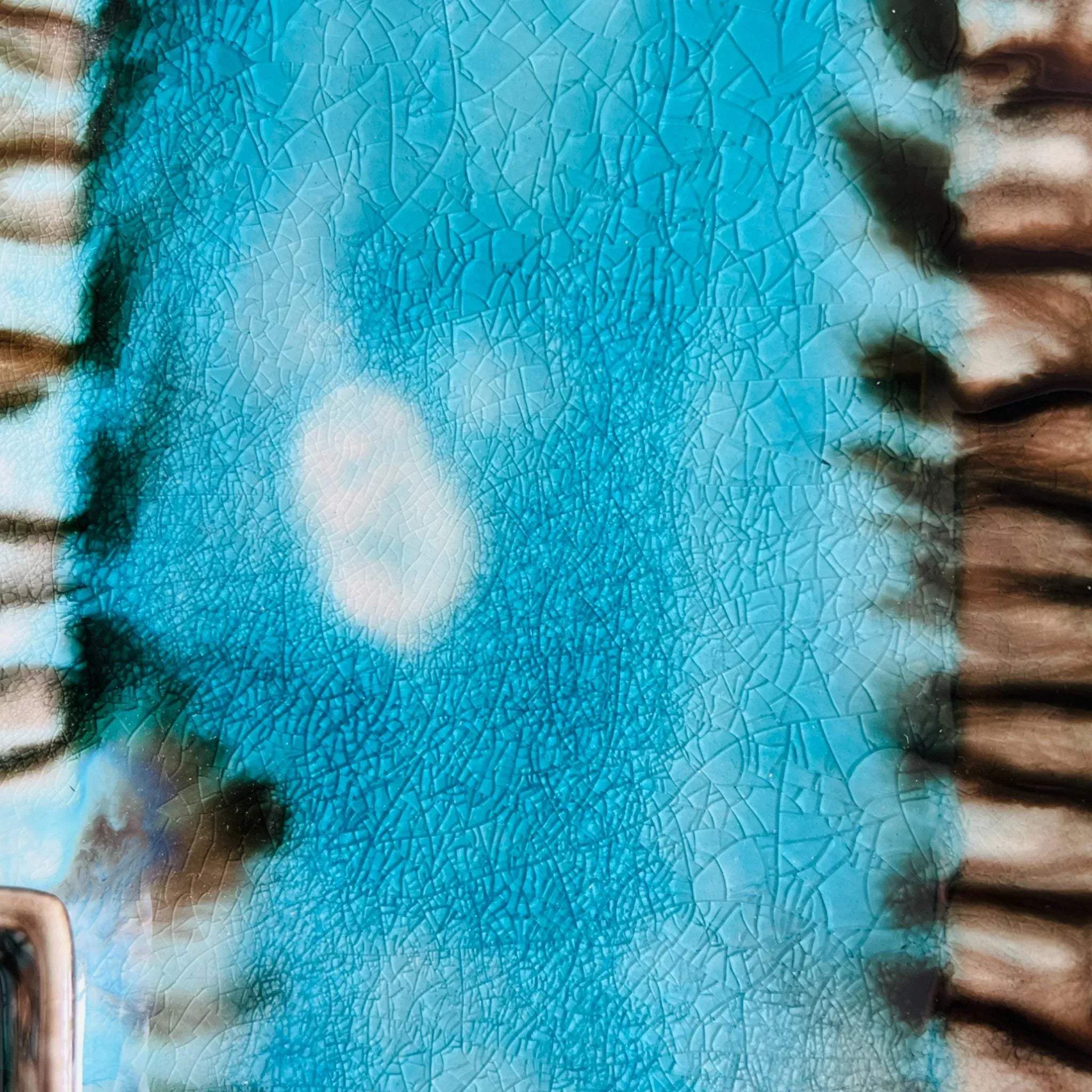 Crystalline glaze texture; reactive blue pottery finish and artisanal ceramic detail for design mood boards.