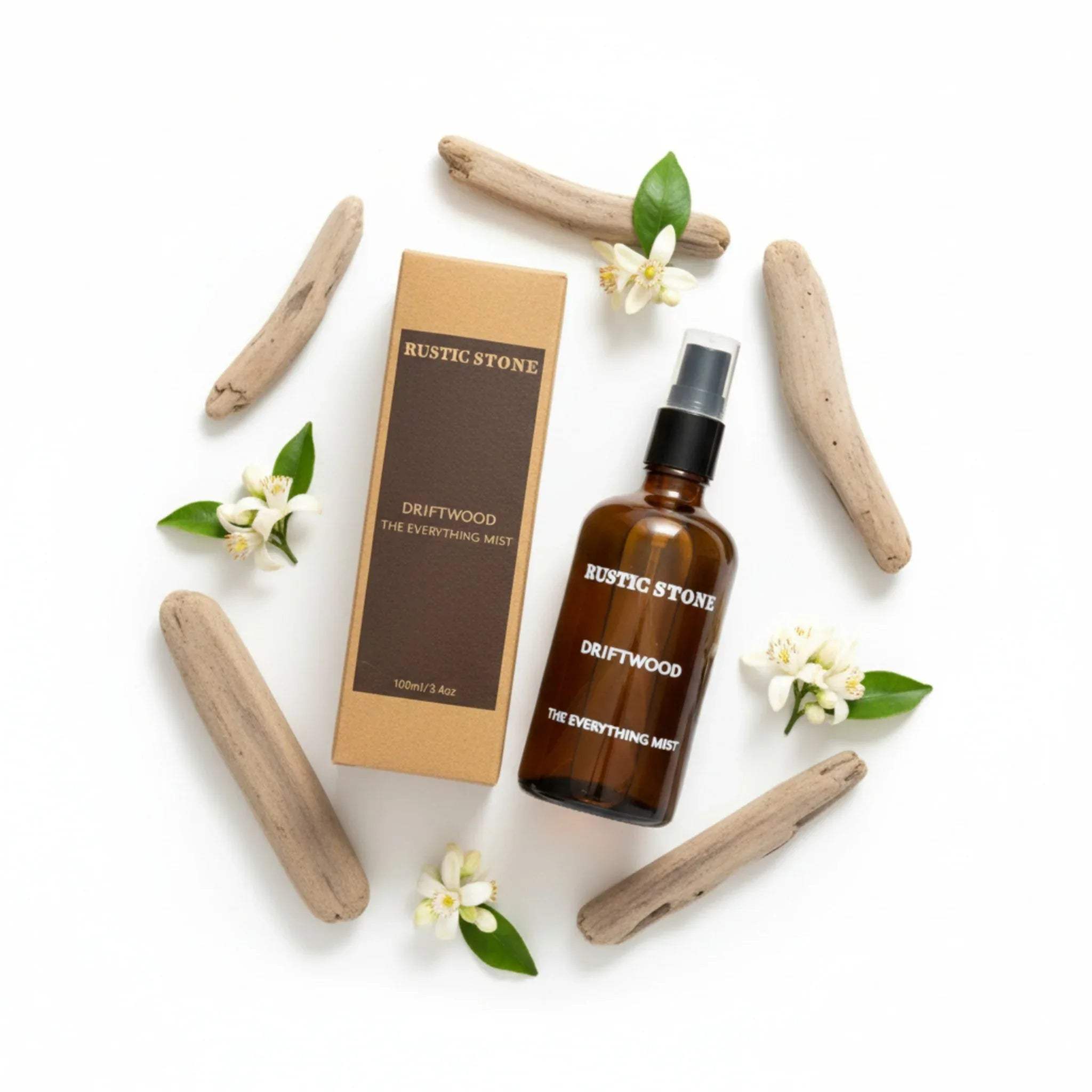 Rustic Stone Driftwood product with bottle, box; paraben-free, fabric-safe, and handcrafted coastal room fragrance.