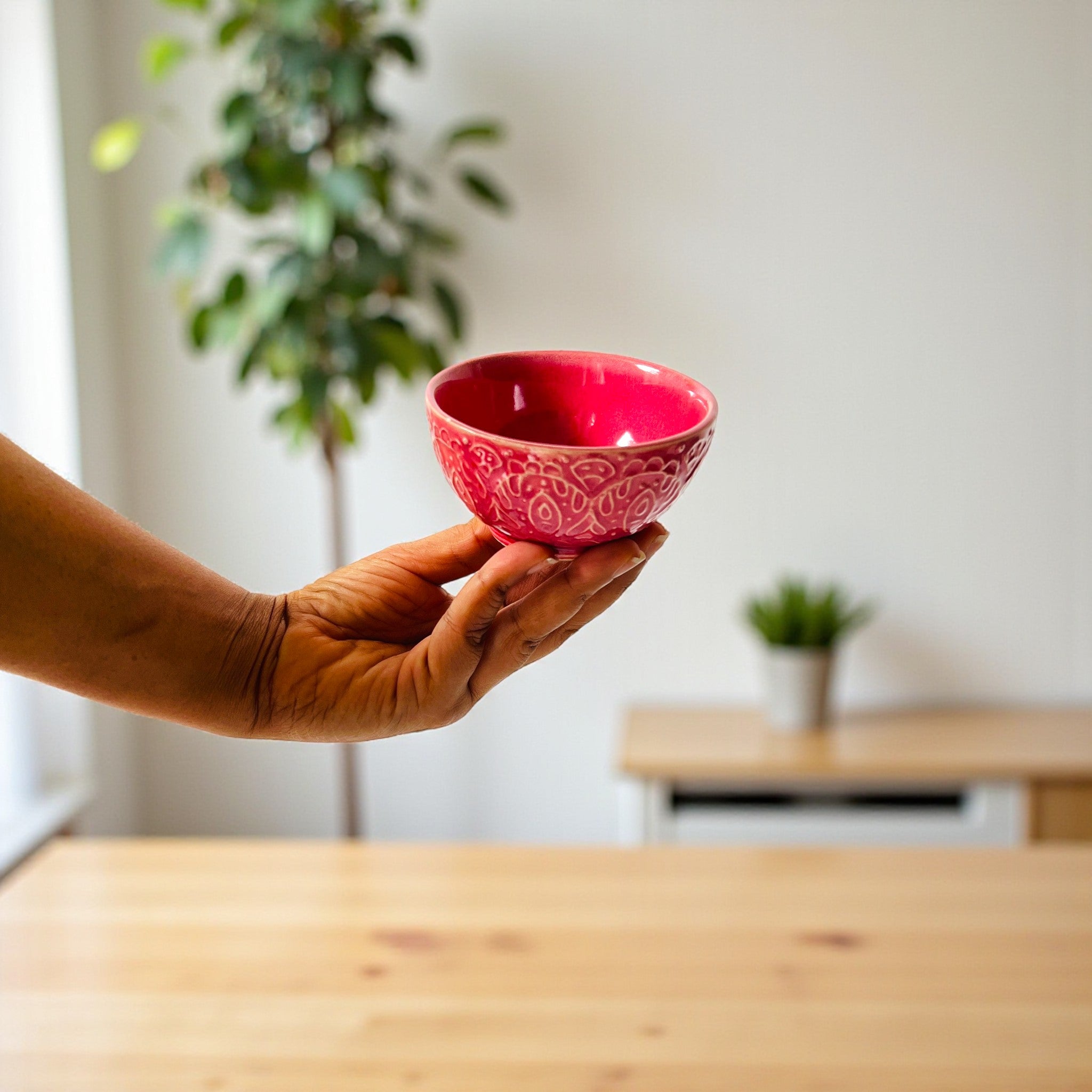 Fuchsia Flair Bowl in hand; 140ml capacity perfect for individual servings of berries, dips, or desserts.