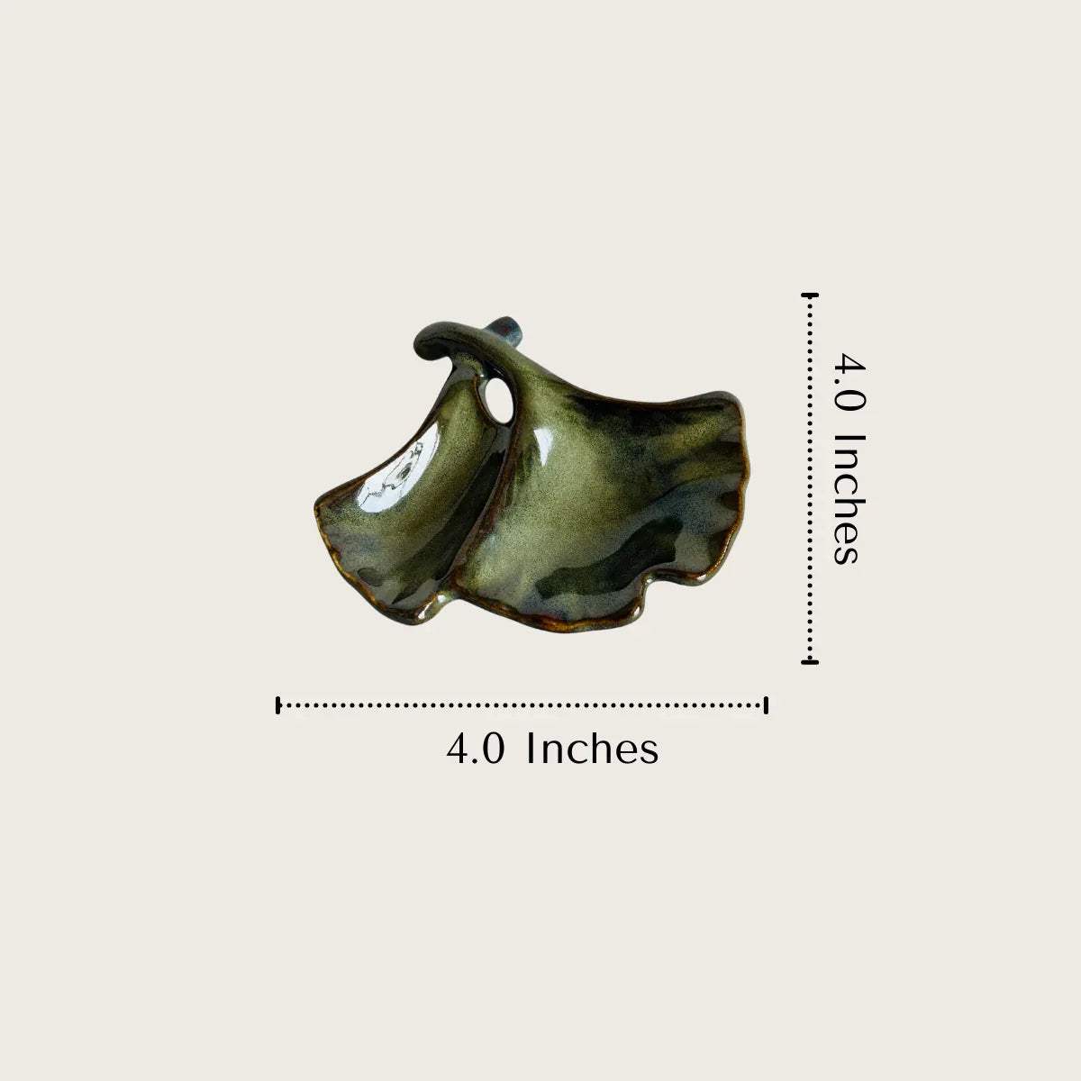 Ginkgo size; 4-inch wide leaf-shaped ceramic dish; ideal for small trinkets and delicate jewellery.
