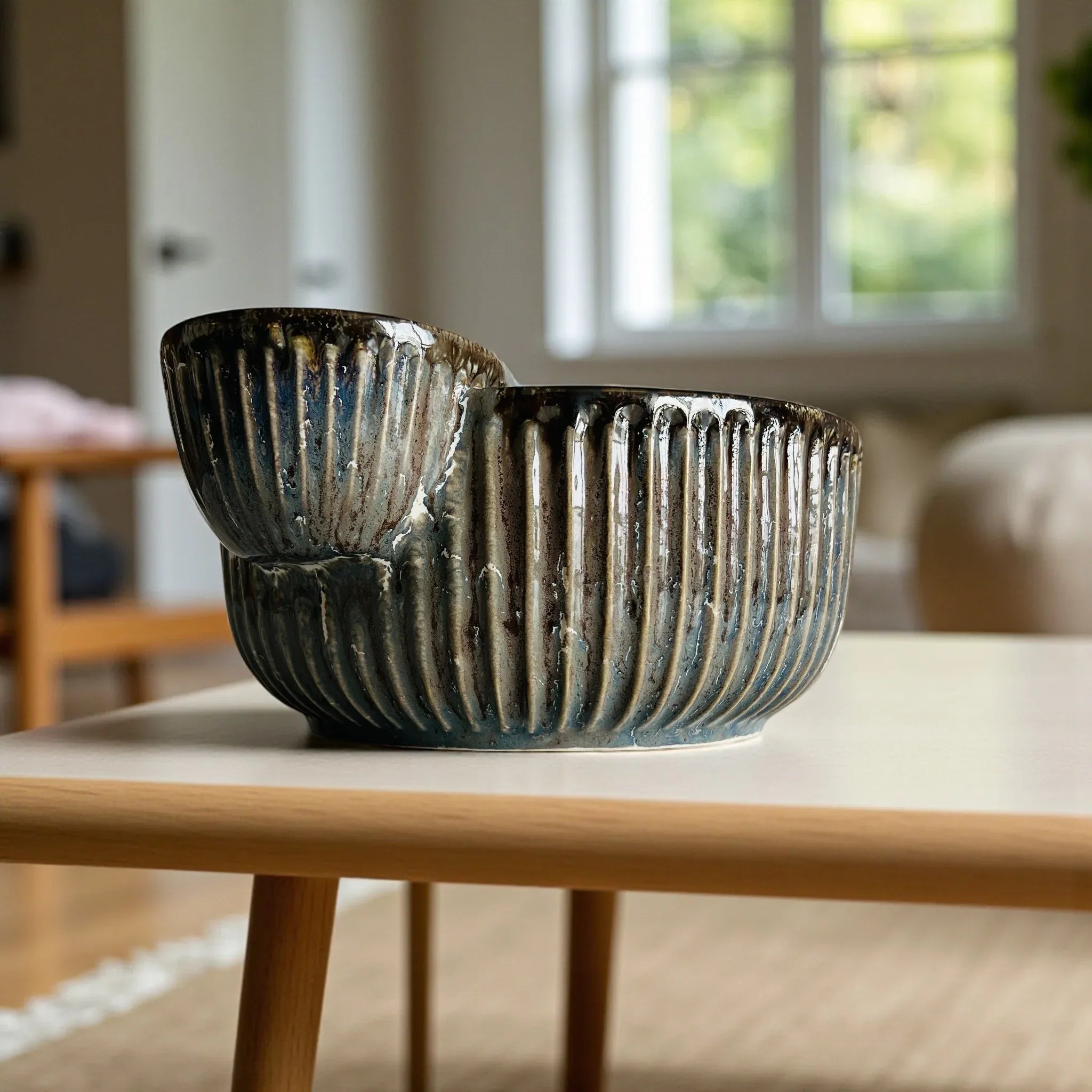 Side profile of the high-fired ceramic; showing the sturdy base and handcrafted irregularities that add character.