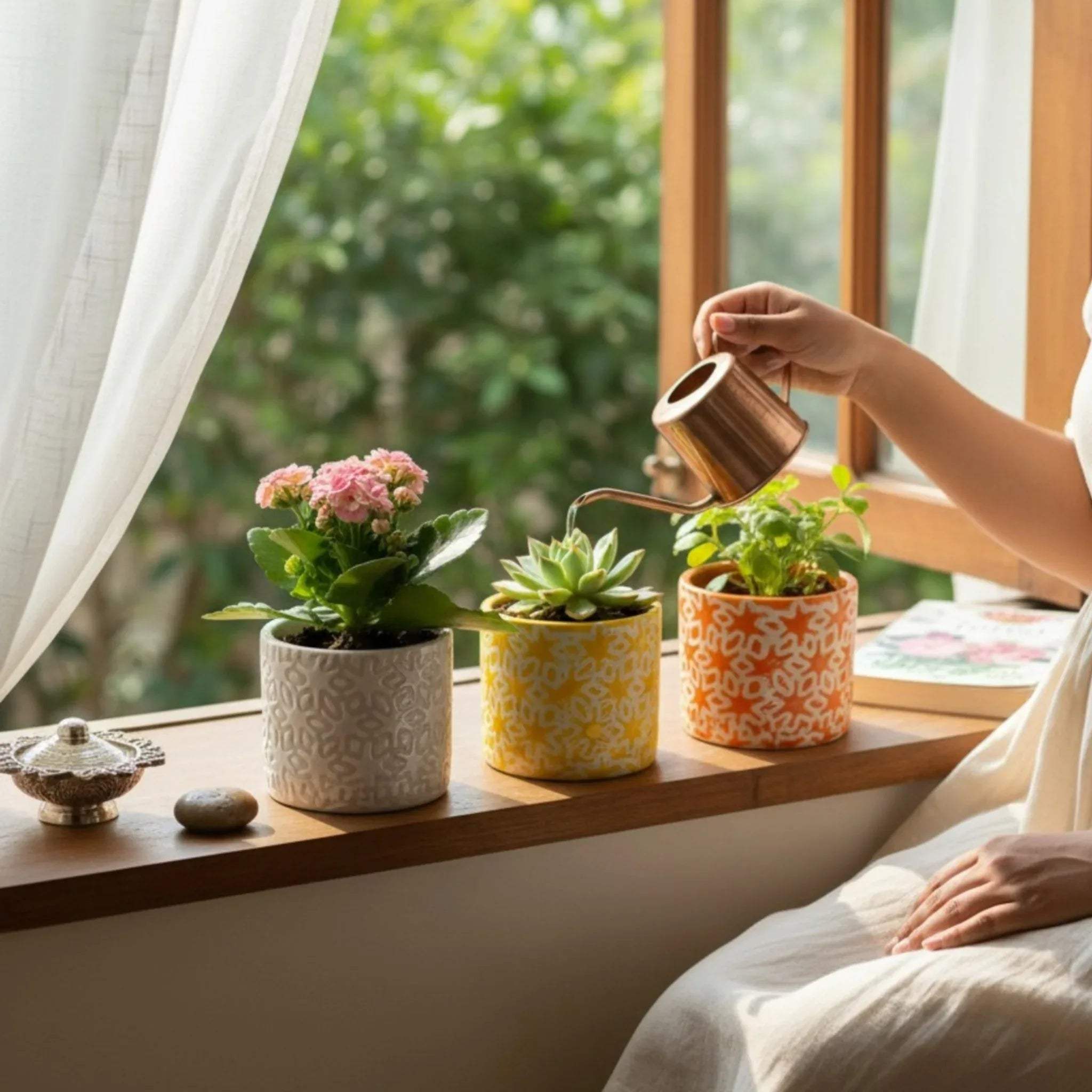 Handheld planter shot; showing the artisan texture and compact size of the Citrus Squad orange planter.