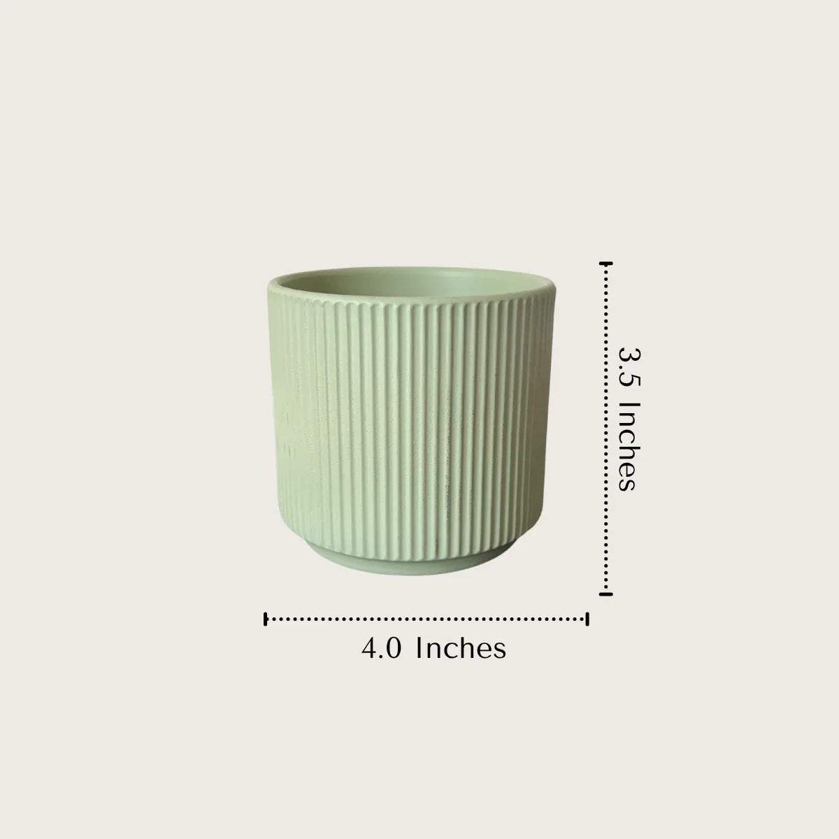 Planter set sizes; green, white, yellow and grey ceramic pots with 4 inch diameter for a cohesive plant display.