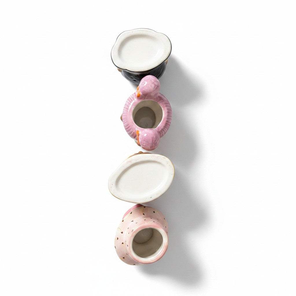 The bottom view showcasing the solid hole-free base design of the ceramic head planters to prevent desktop water runoff.