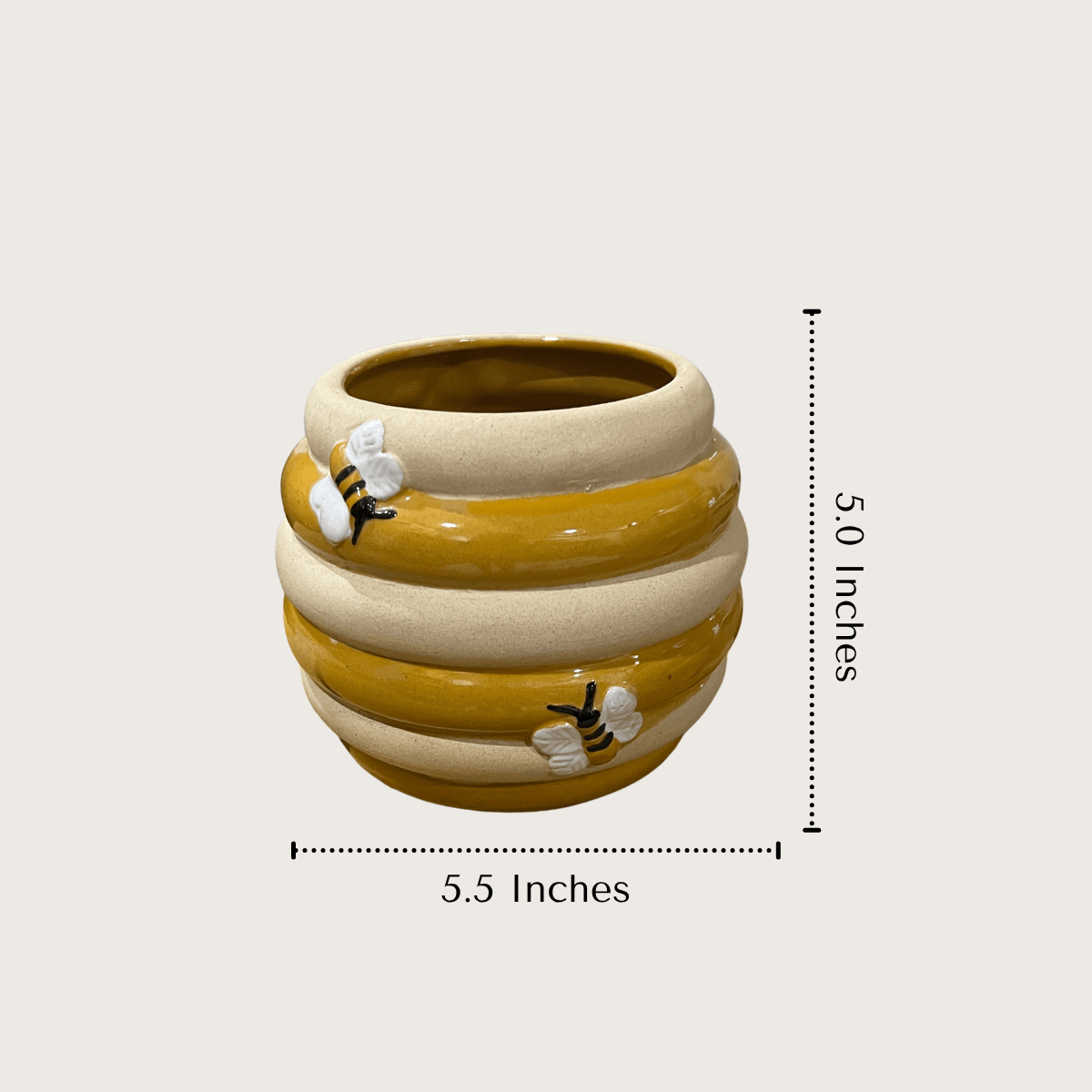 Product measurement diagram showing the 5.0 inches height and widest 5.5 inches diameter dimensions of the storybook honey pot planter.