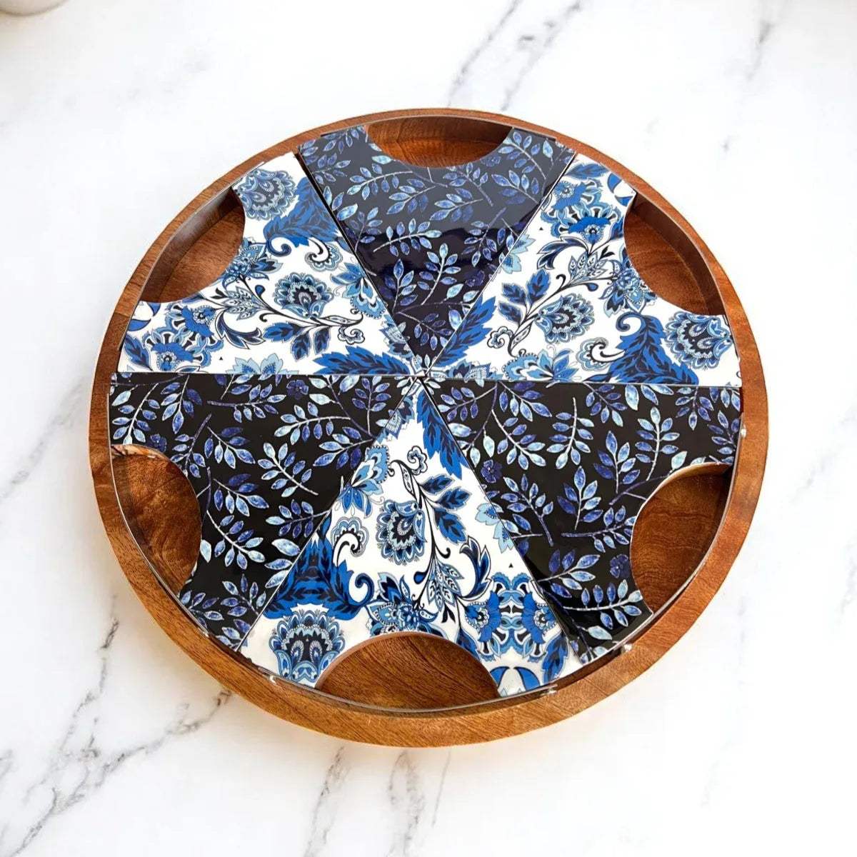 Top view of indigo enamel petal motif; handcrafted mango wood grain and vibrant blue floral inlay finish.