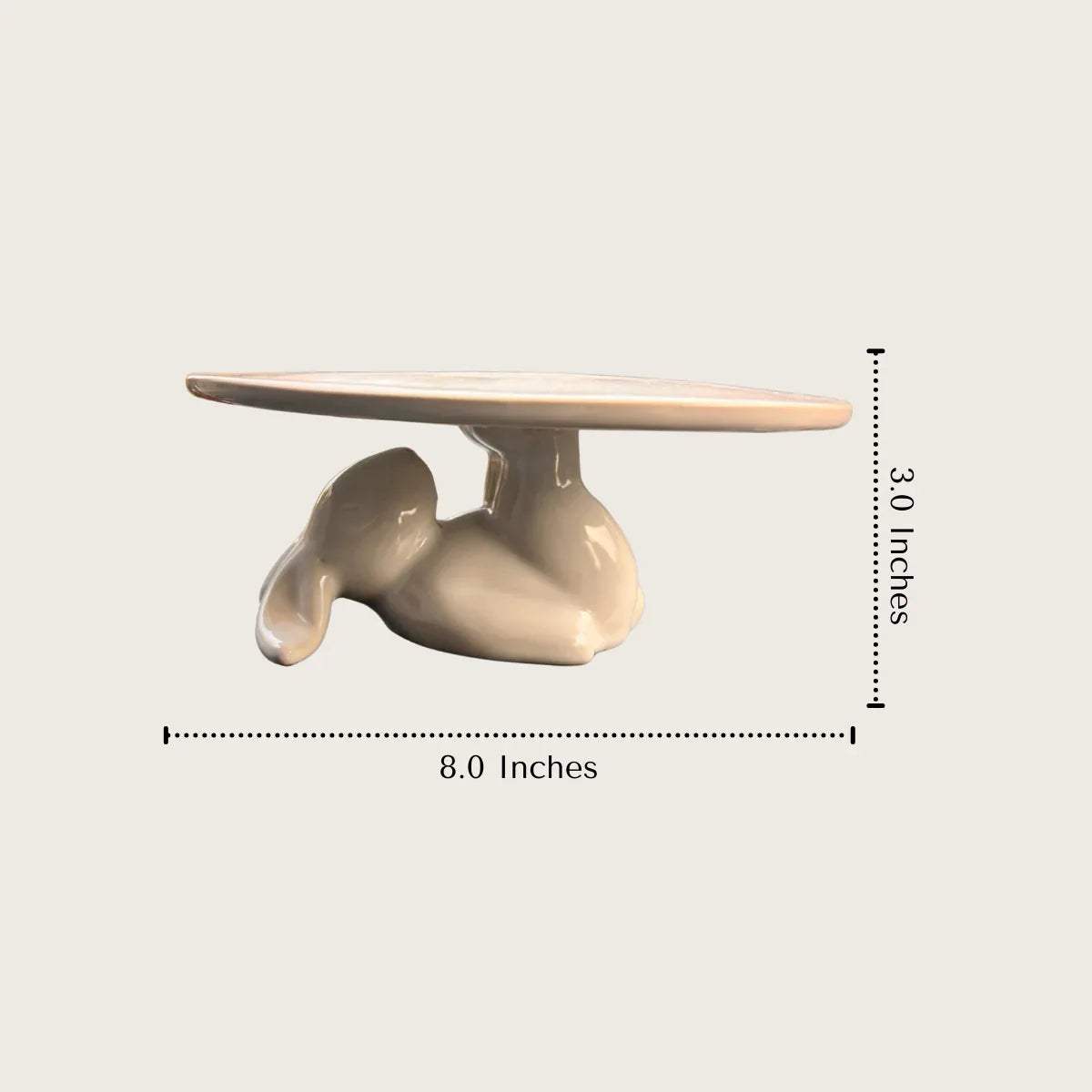 Bunny Stand size; elevated ceramic dessert plate with a sturdy bunny base for stable display.