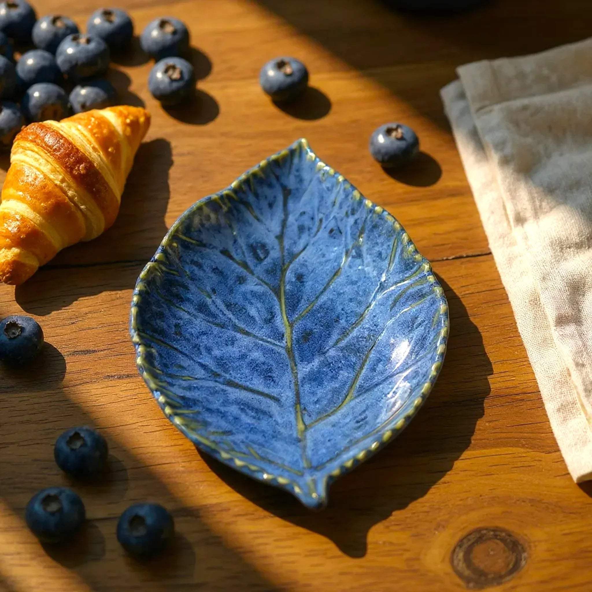 Rustic Stone Leaf of Serenity 11" Platter; large blue ceramic leaf serving tray with intricate vein detailing.