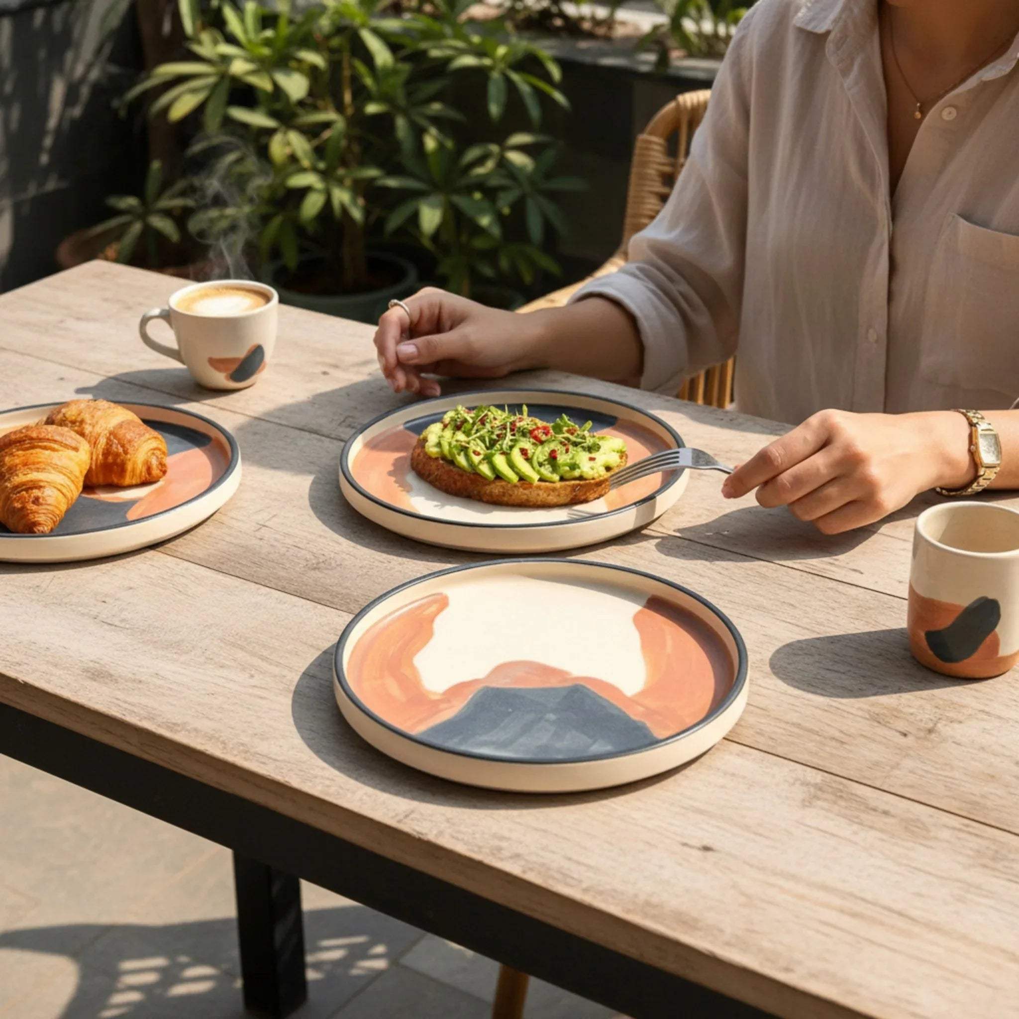 The Mesa Snack Plate Set; two handcrafted ceramic plates with a rustic, desert-inspired dual-tone finish.
