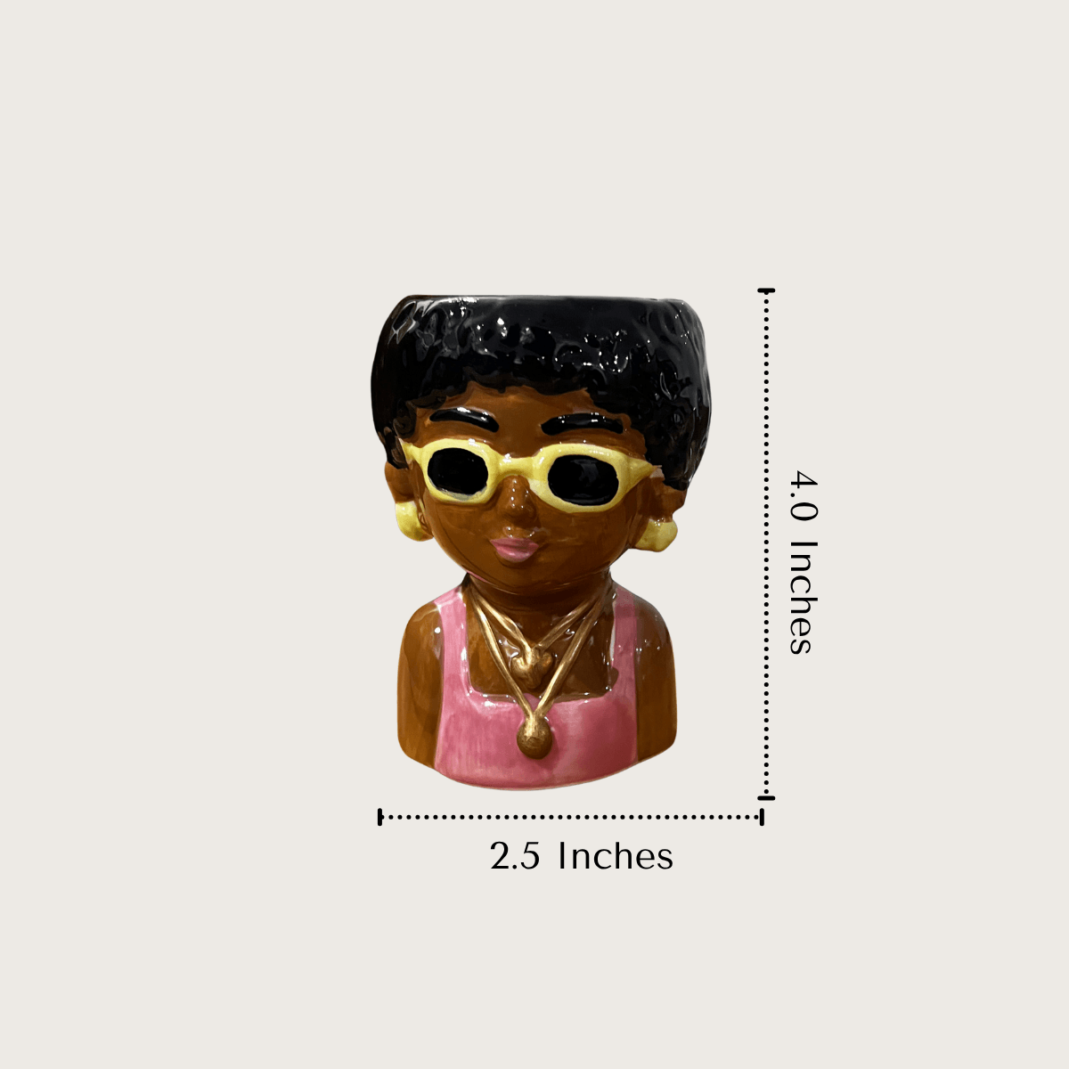 Product measurement diagram displaying the 4 inches height and 2.5 inches diameter of the mini ceramic face planters.
