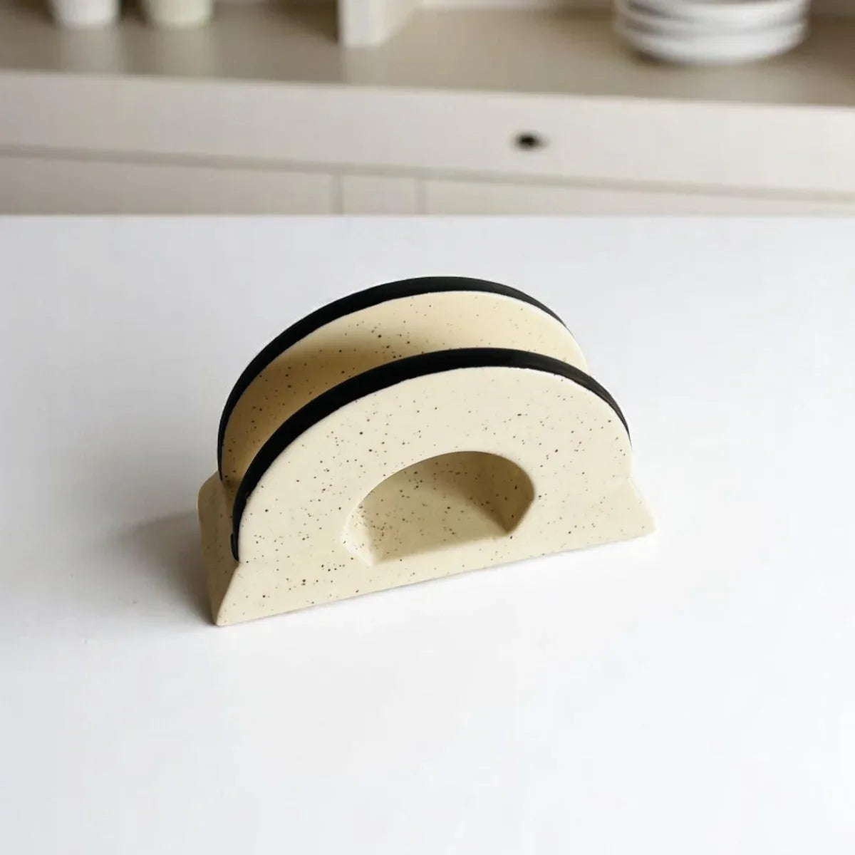 Smooth matte white finish; close-up of the clean rectangular edges and wide slot for easy tissue dispensing.