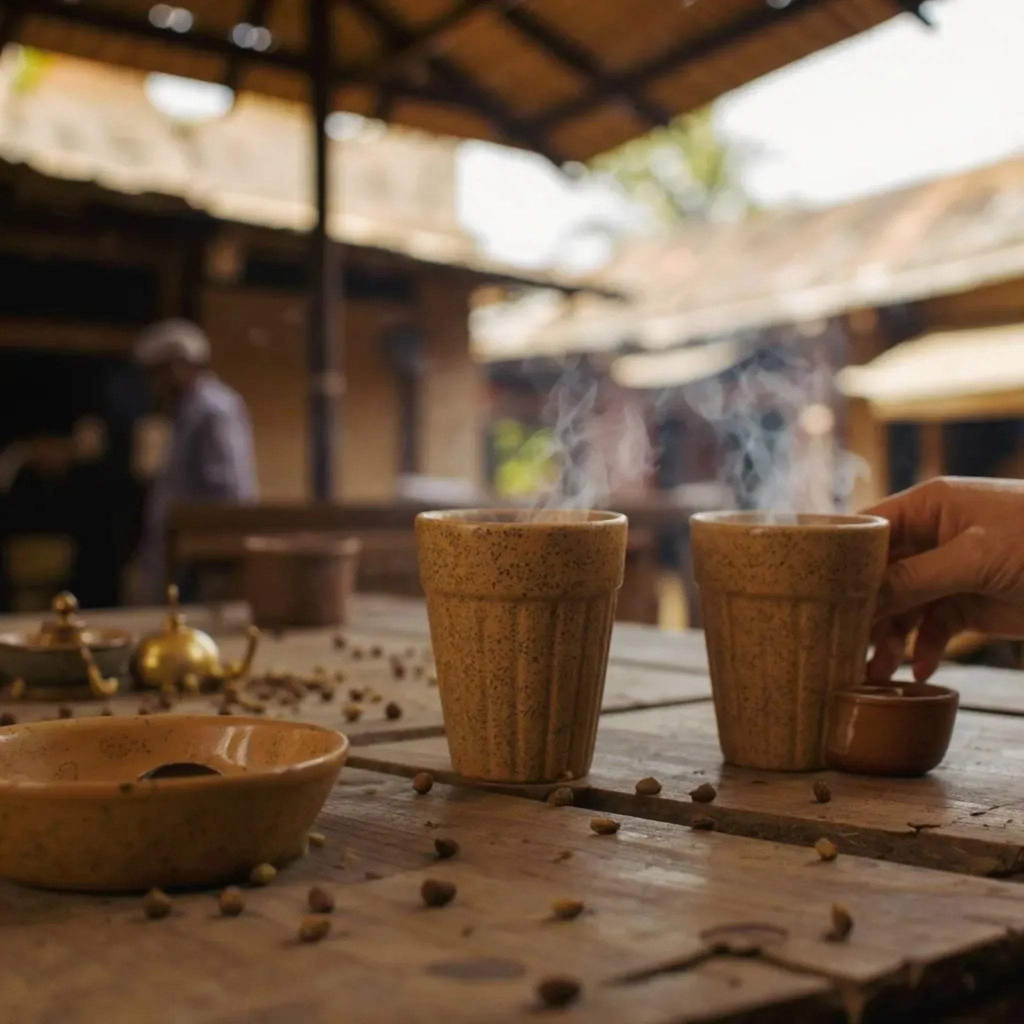 Monsoon vibes; steaming chai in the terra kulhads sitting on a chai tapri.
