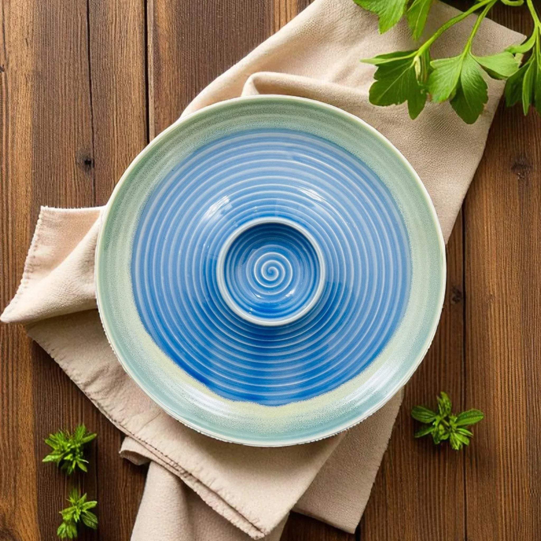 Ocean Breeze Chip and Dip Platter; handcrafted blue ceramic serving dish with integrated dip compartment.