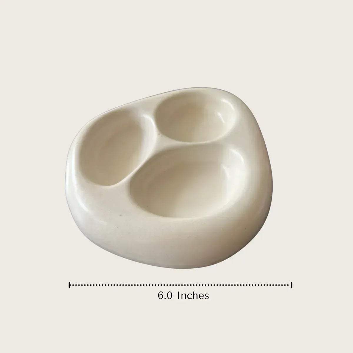 Pebble Trio specs; 6.0" diameter organic diameter, handcrafted durable ceramic with 3 deep-set storage wells.