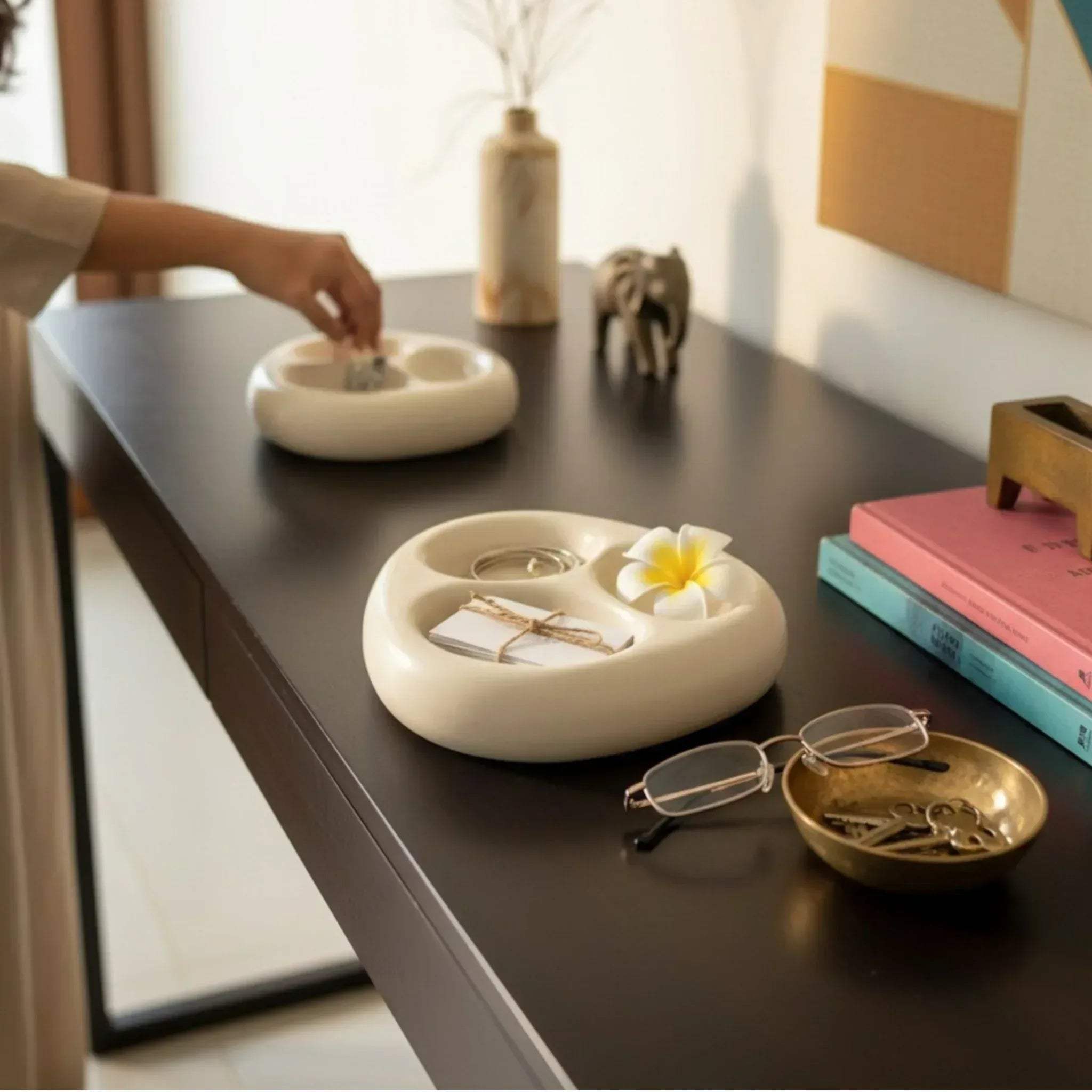 Pebble Trio trinket tray on a modern entry console holding keys, loose change, and everyday knick-knacks.