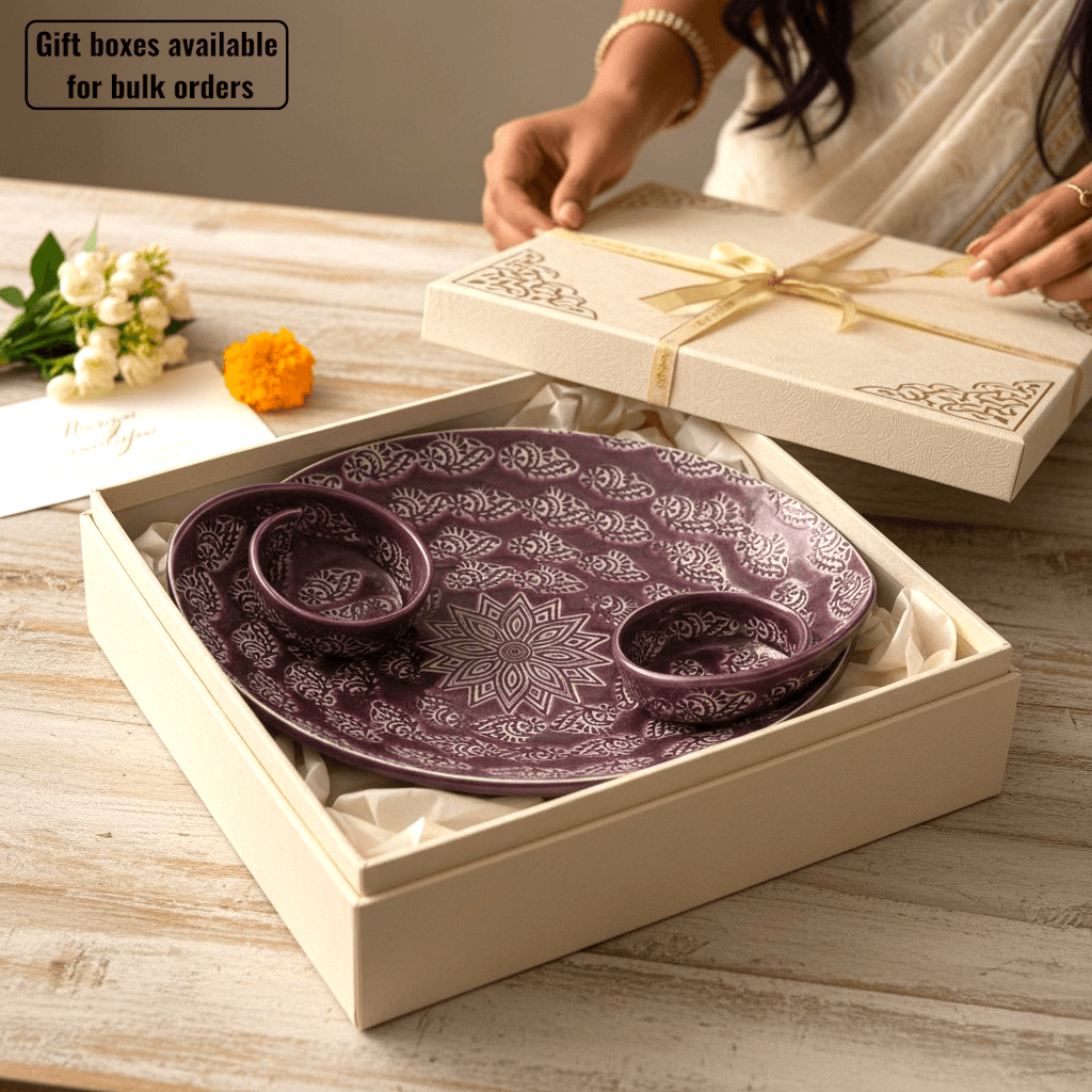 The hand-finished Pankhuri purple ceramic chip and dip tray wrapped beautifully as a premium housewarming or wedding gift.