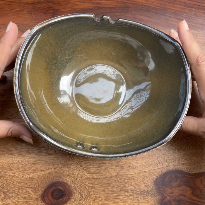 Product video of ceramic ramen bowl with chopstick holders in blue and brown.