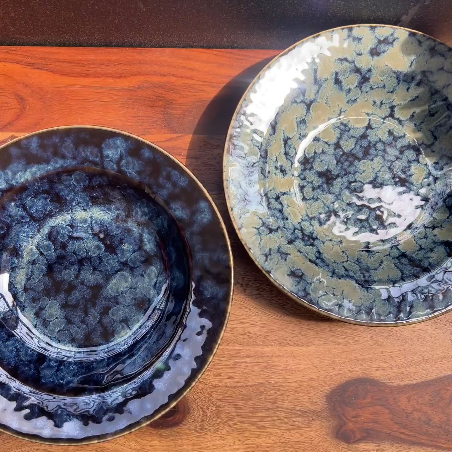 Product video of blue reactive glaze ceramic pasta plate.