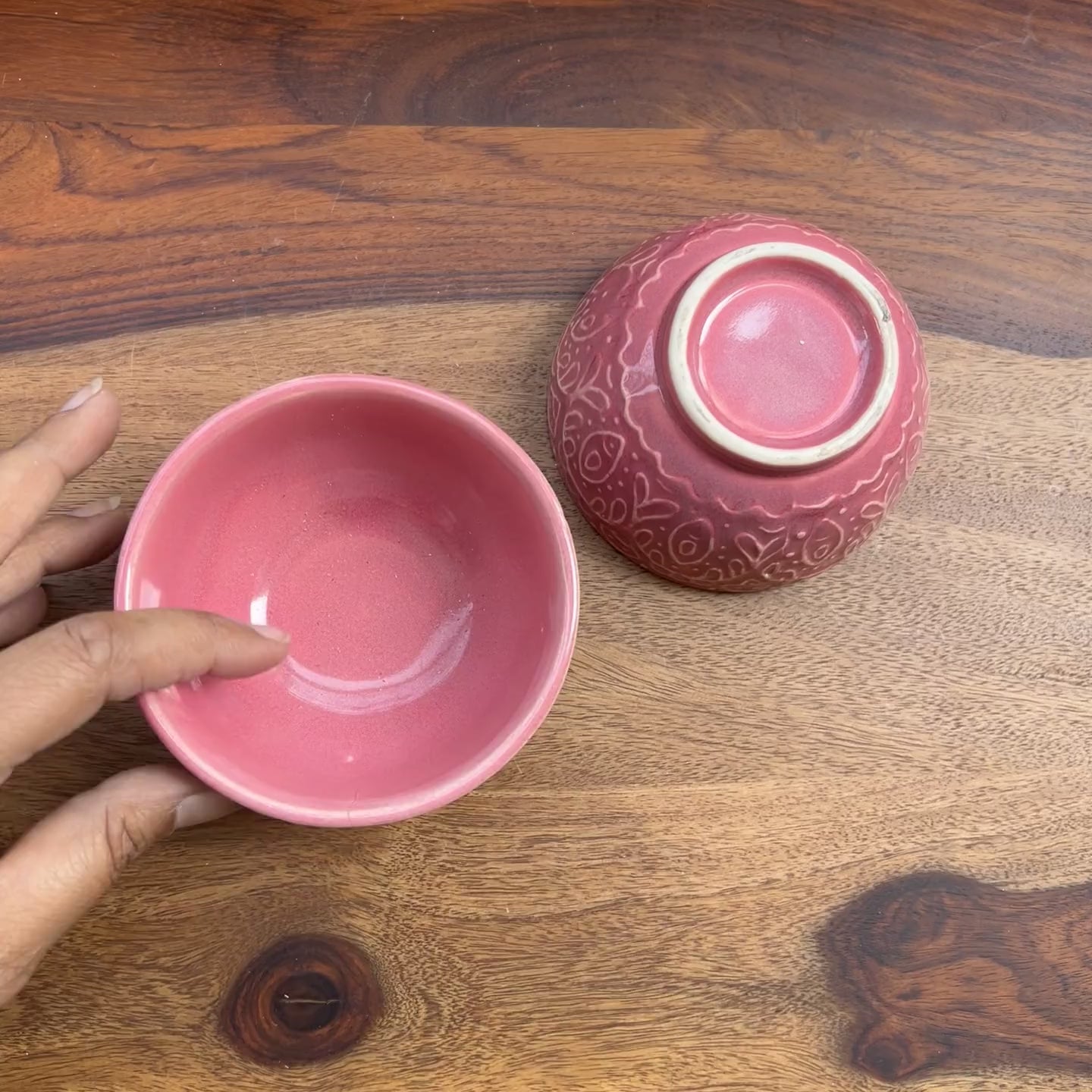 Product video of pink ceramic bowls with hand engraving.