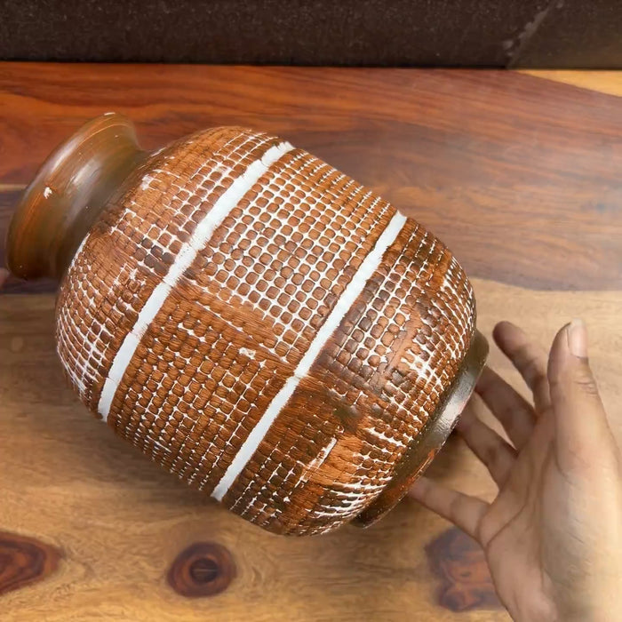 Product video of ceramic brown vase.