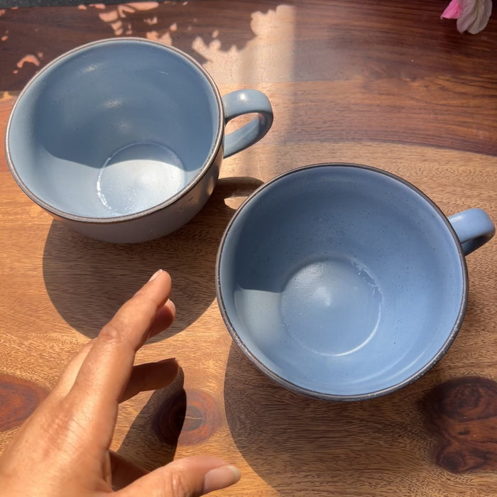 Product video of a blue ceramic coffee mug.