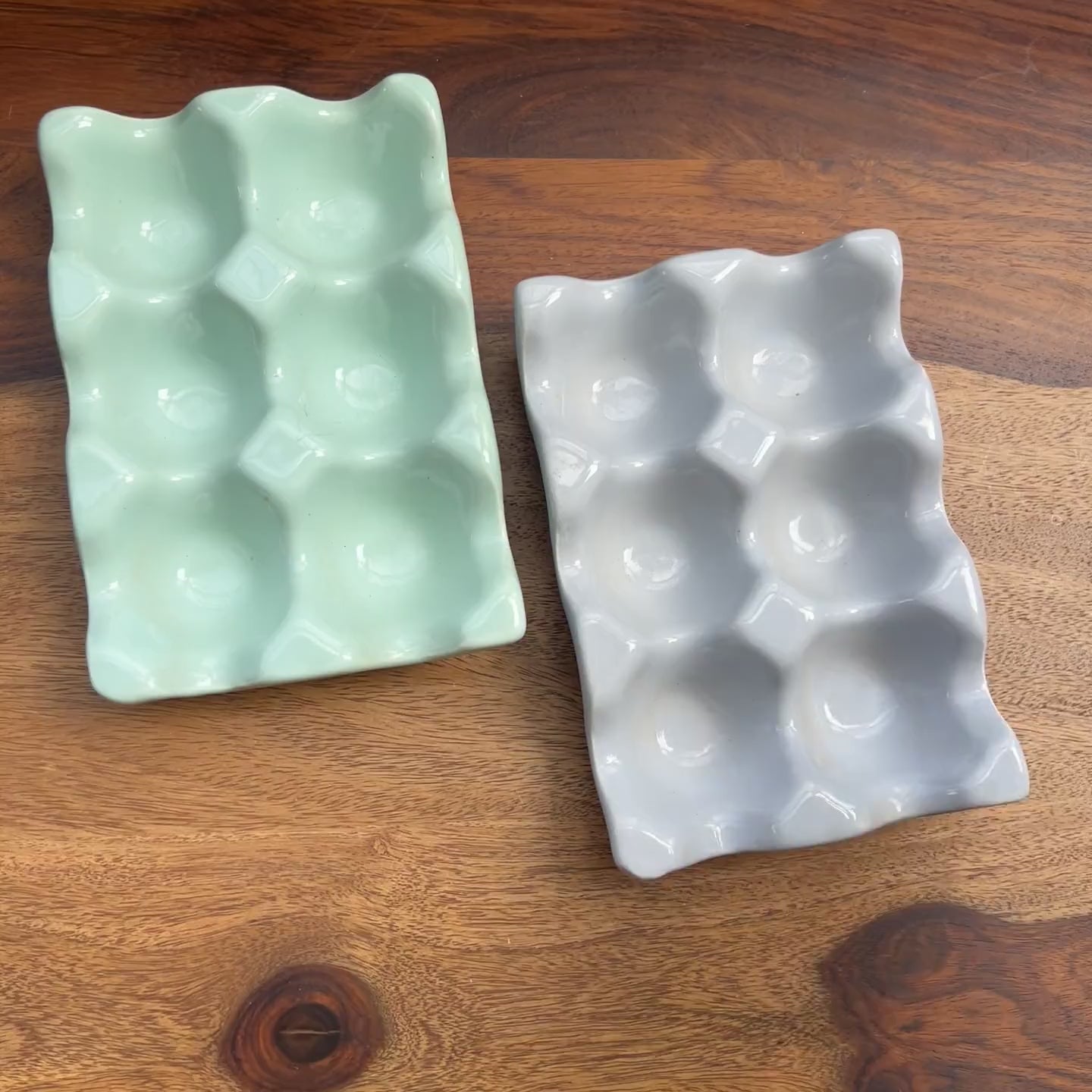 Product video of ceramic light weight egg tray for 6 eggs in blue, green, grey.