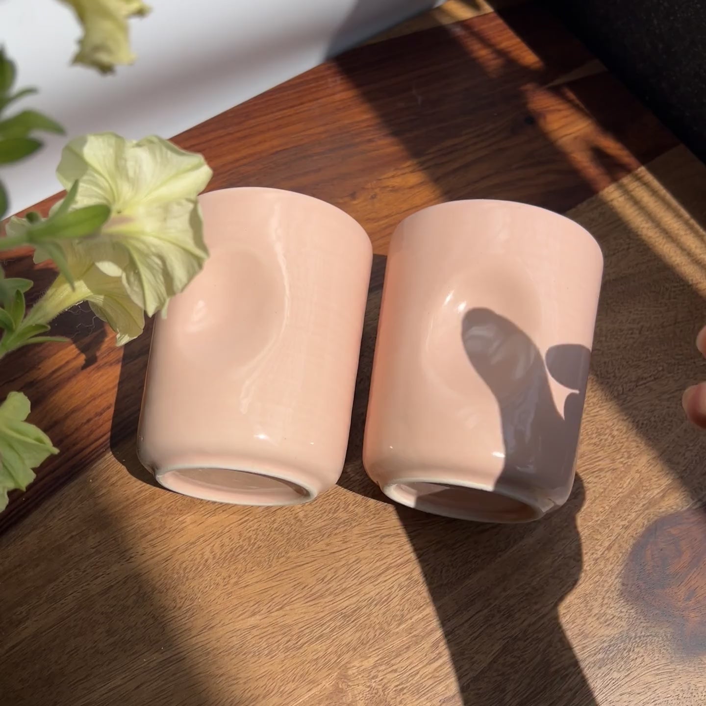 Unedited clip of the ceramic pink glasses with maker's thumbprint. Make it microwave and dishwasher safe. 