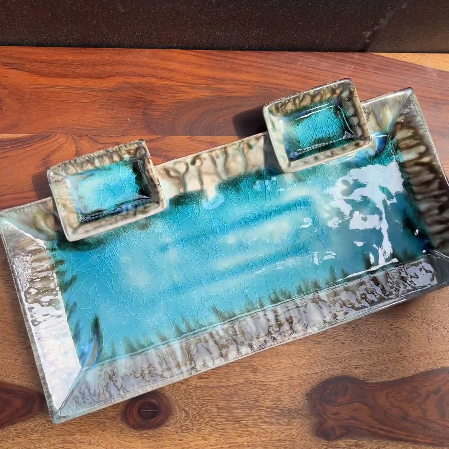 Product video of ceramic sushi platter in blue with a broken glass finish.