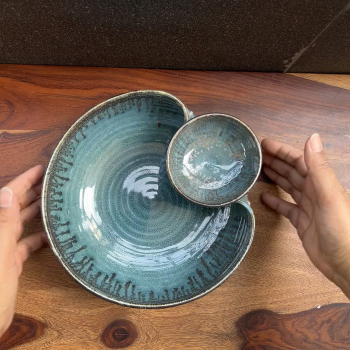 Product video of blue ceramic chip and dip bowl.
