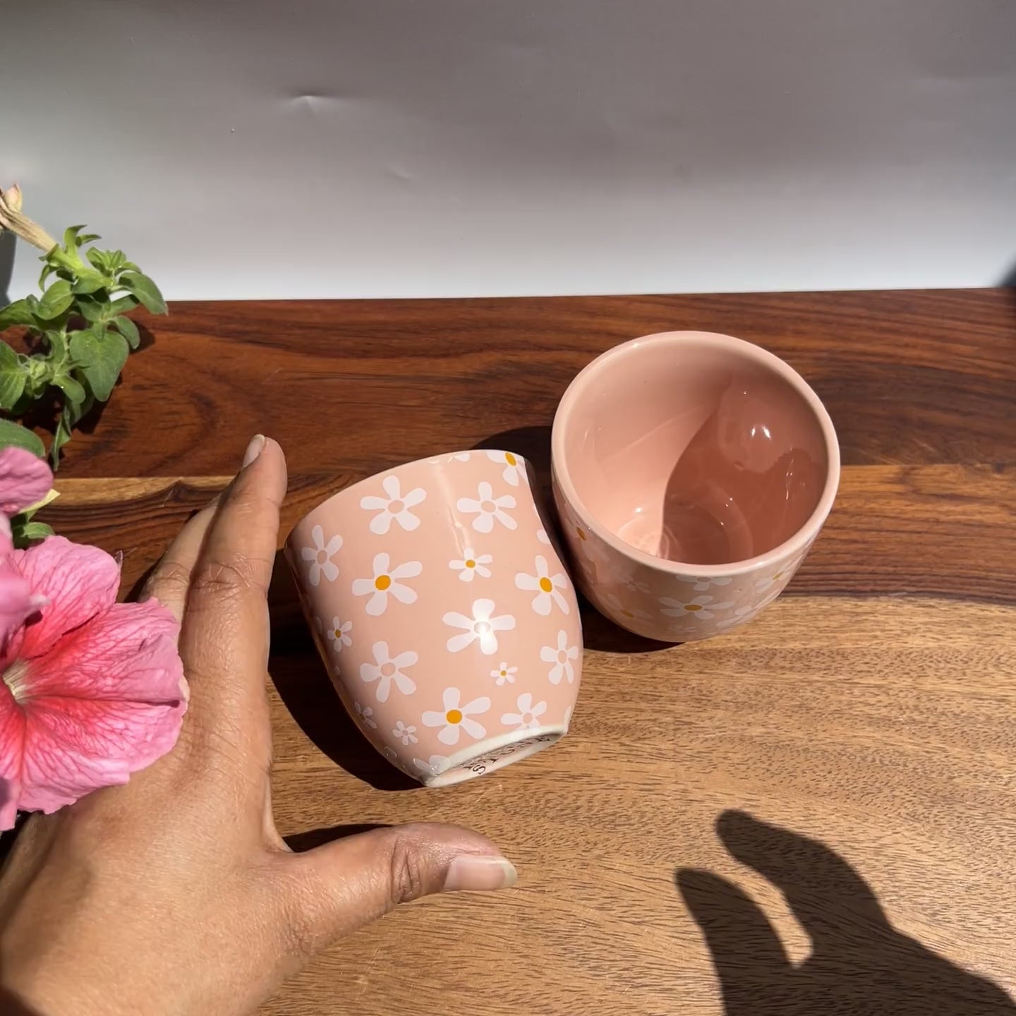 Product video of pink petal perch planters for artificial plants - white daisy printed design.
