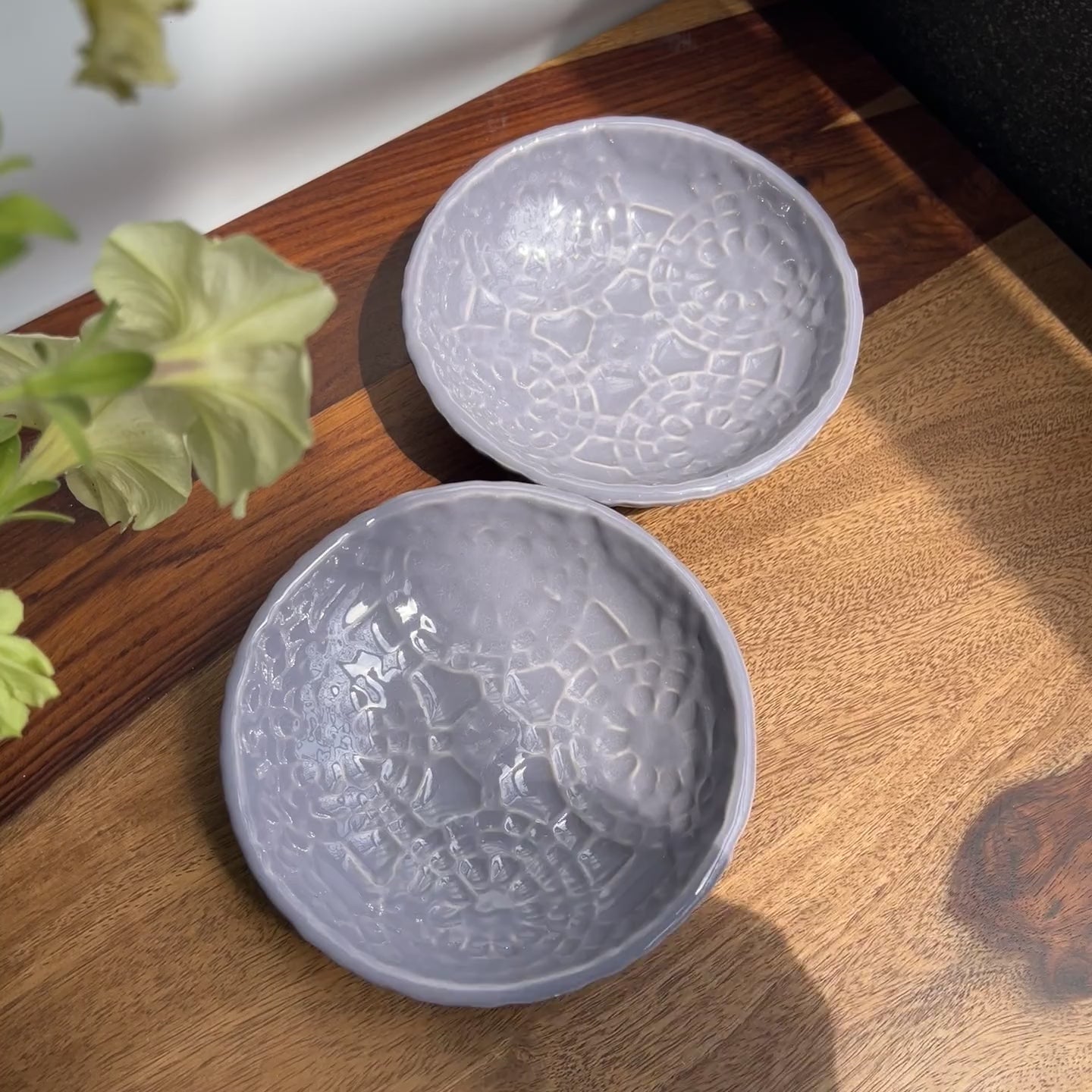 Product video of the Violet Whisper Monkey Dish featuring a unique purple  glaze and intricate geometric patterns.