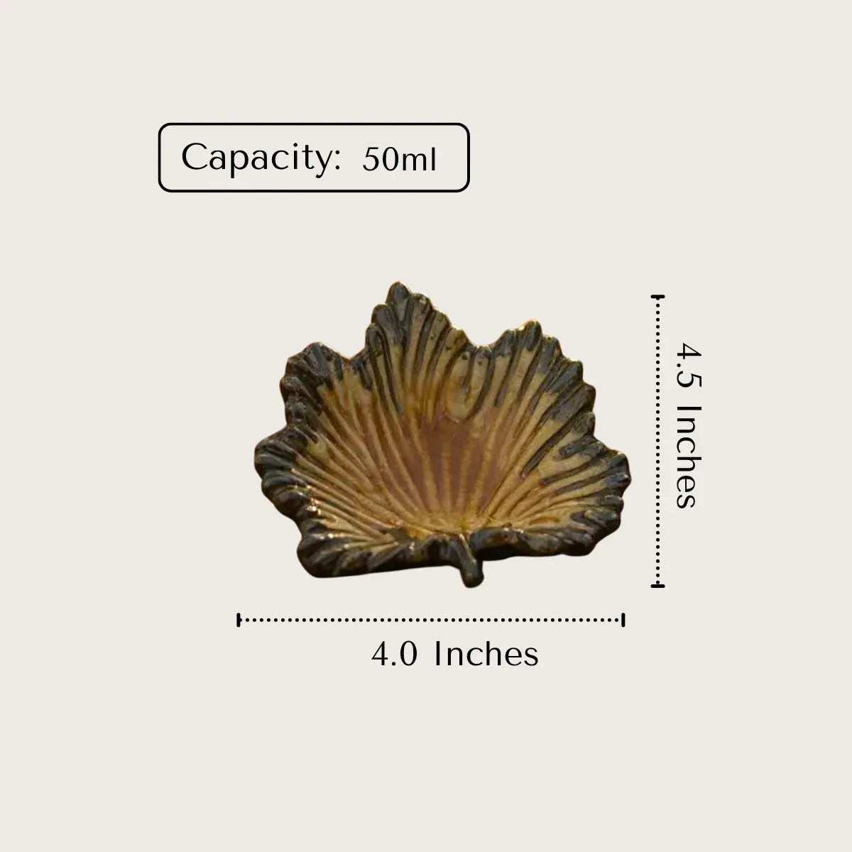 Decorative ceramic leaf with measurements and capacity.