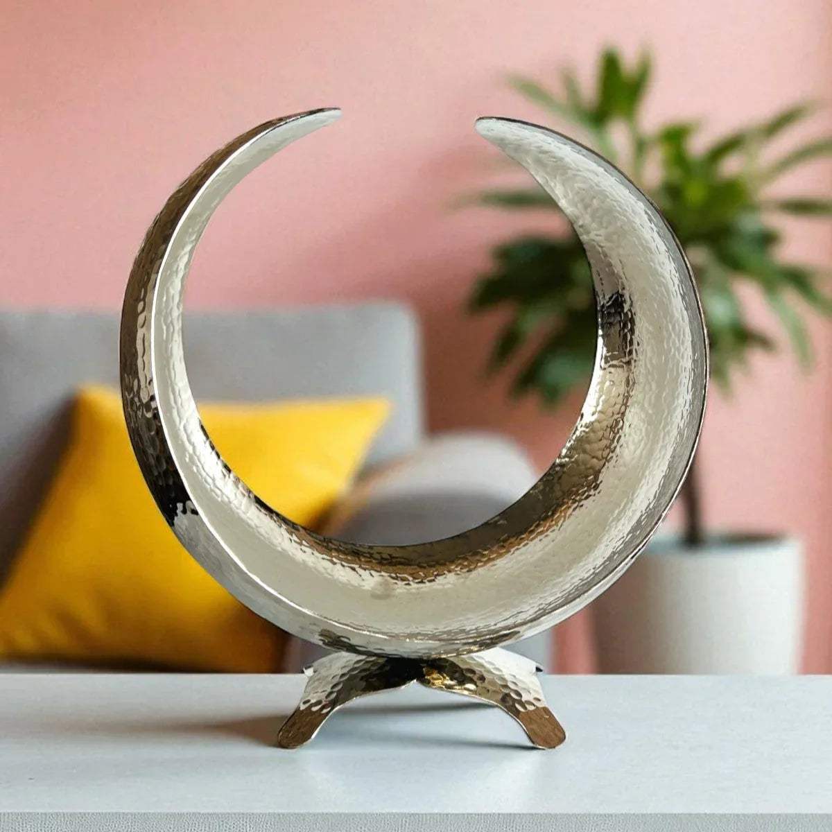 Hammered silver bowl on a marble console; unique gift for art lovers and luxury modern home decor statement ideas.