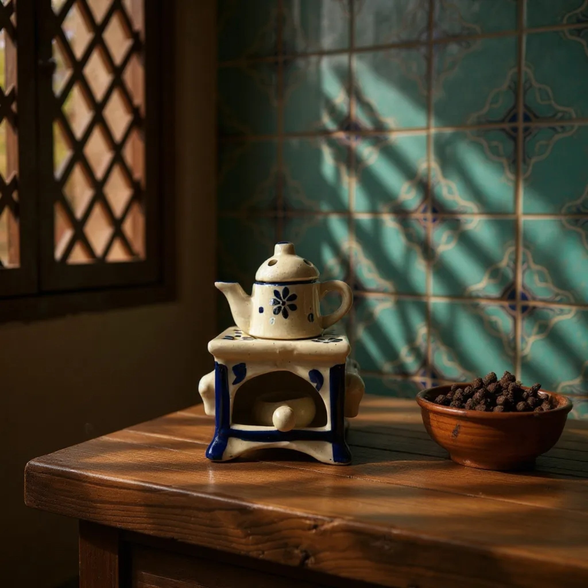 Stove Diffuser next to a bwol; compact size for mantels, side tables, or cozy kitchen nooks.