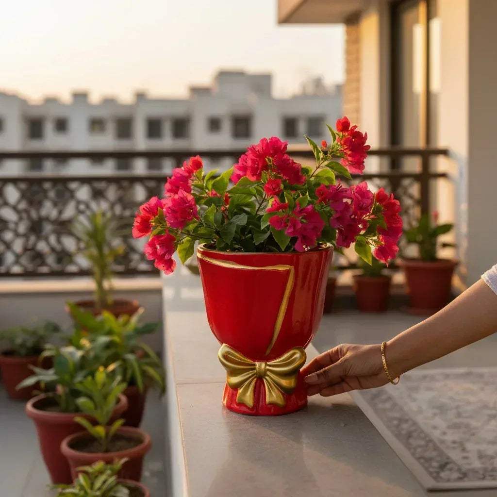 Scarlet Bouquet Planter; aesthetic red ceramic balcony planter with a hand-sculpted golden ribbon bow.
