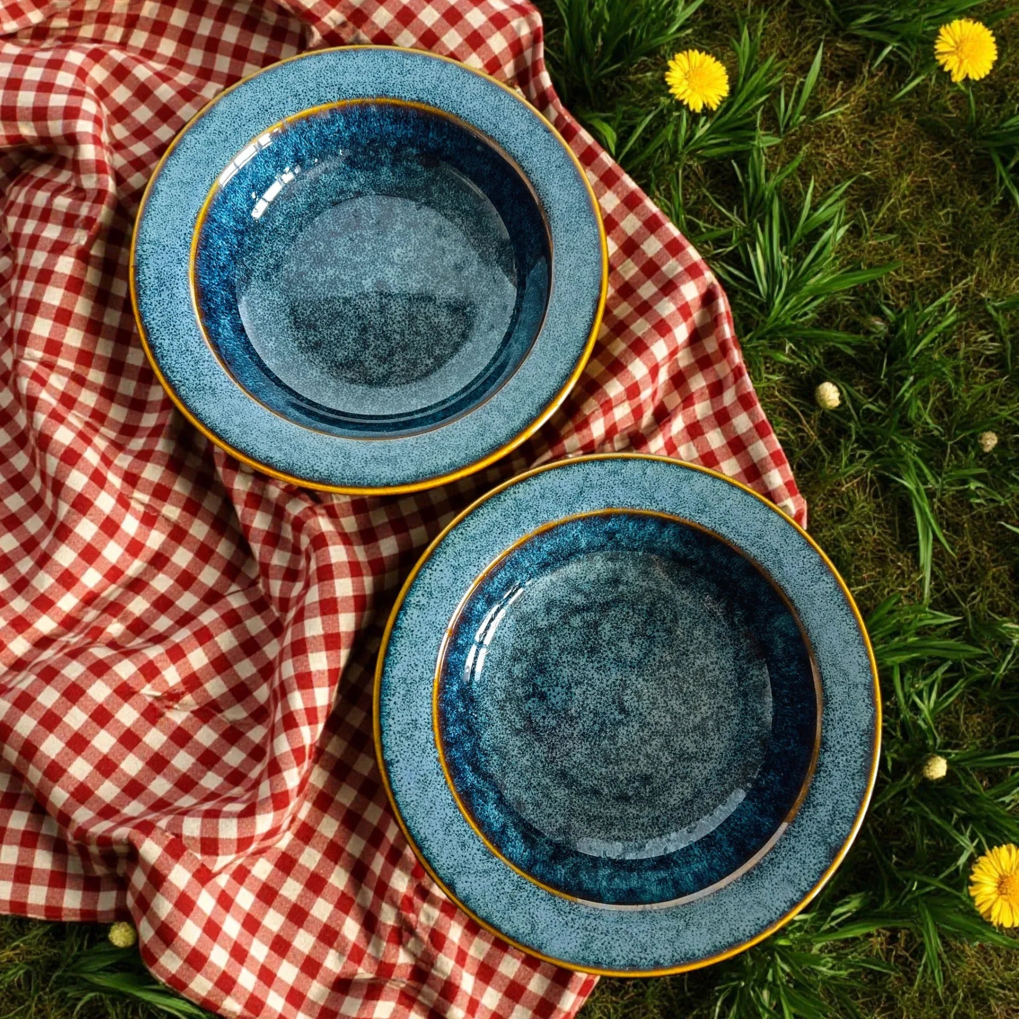 Starry Night Noodle Plate Set; two deep blue ceramic plates with white speckled cosmic glaze.