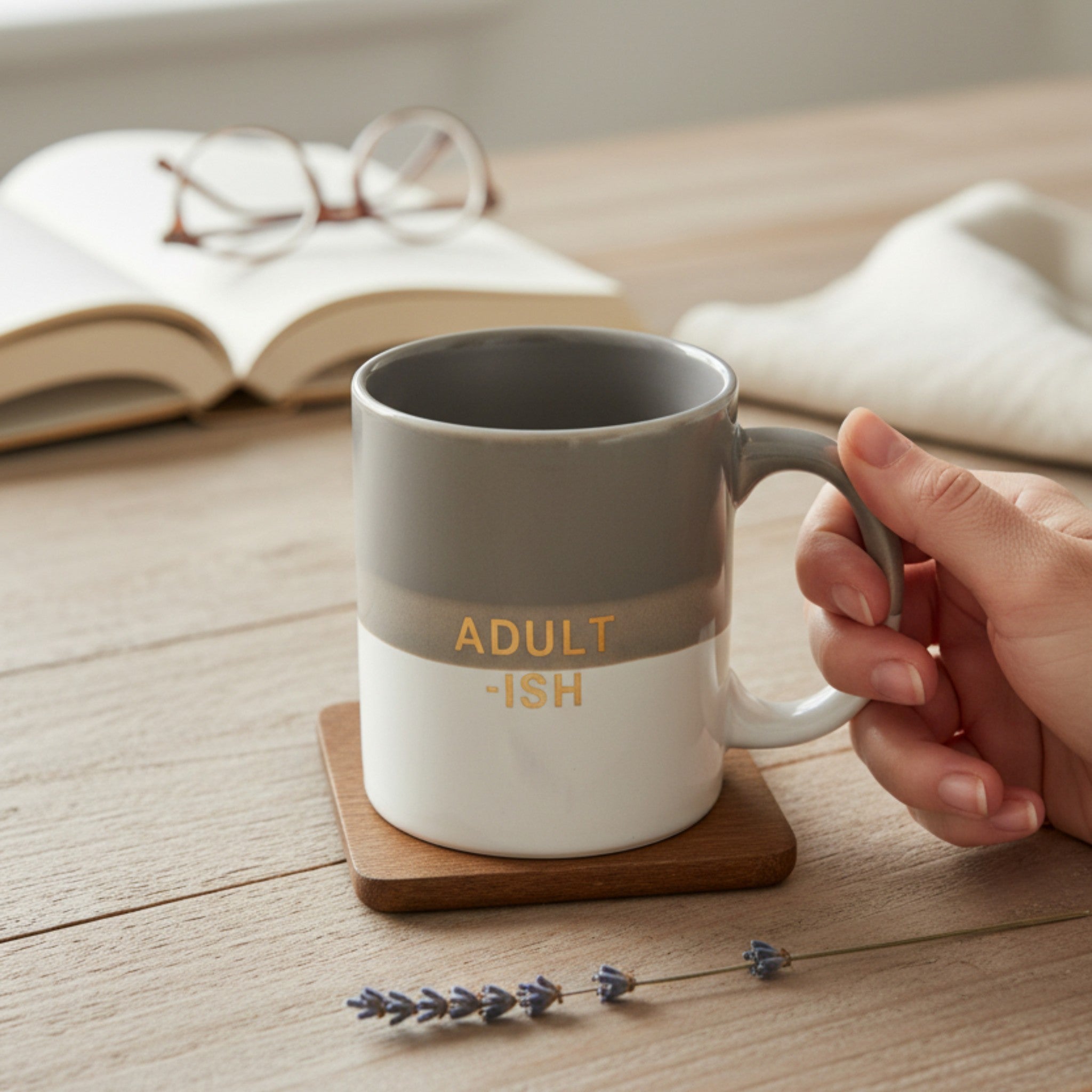 Rustic Stone Adult-ish Cup; minimalist white ceramic mug with bold gold Adult-ish typography.
