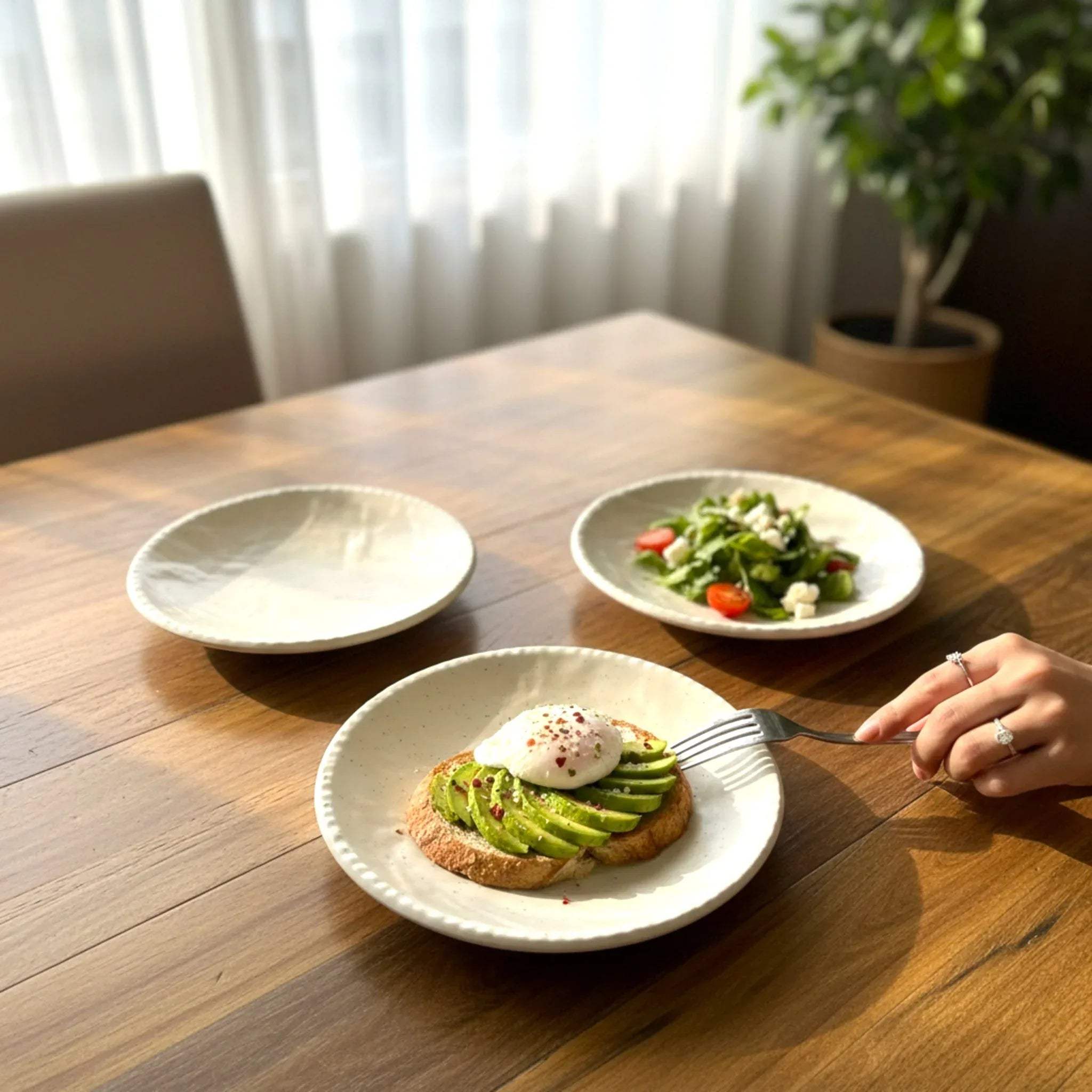 Vanilla Bean Appetizer Plates; set of 2 cream-colored ceramic plates with delicate brown speckles and a matte finish.