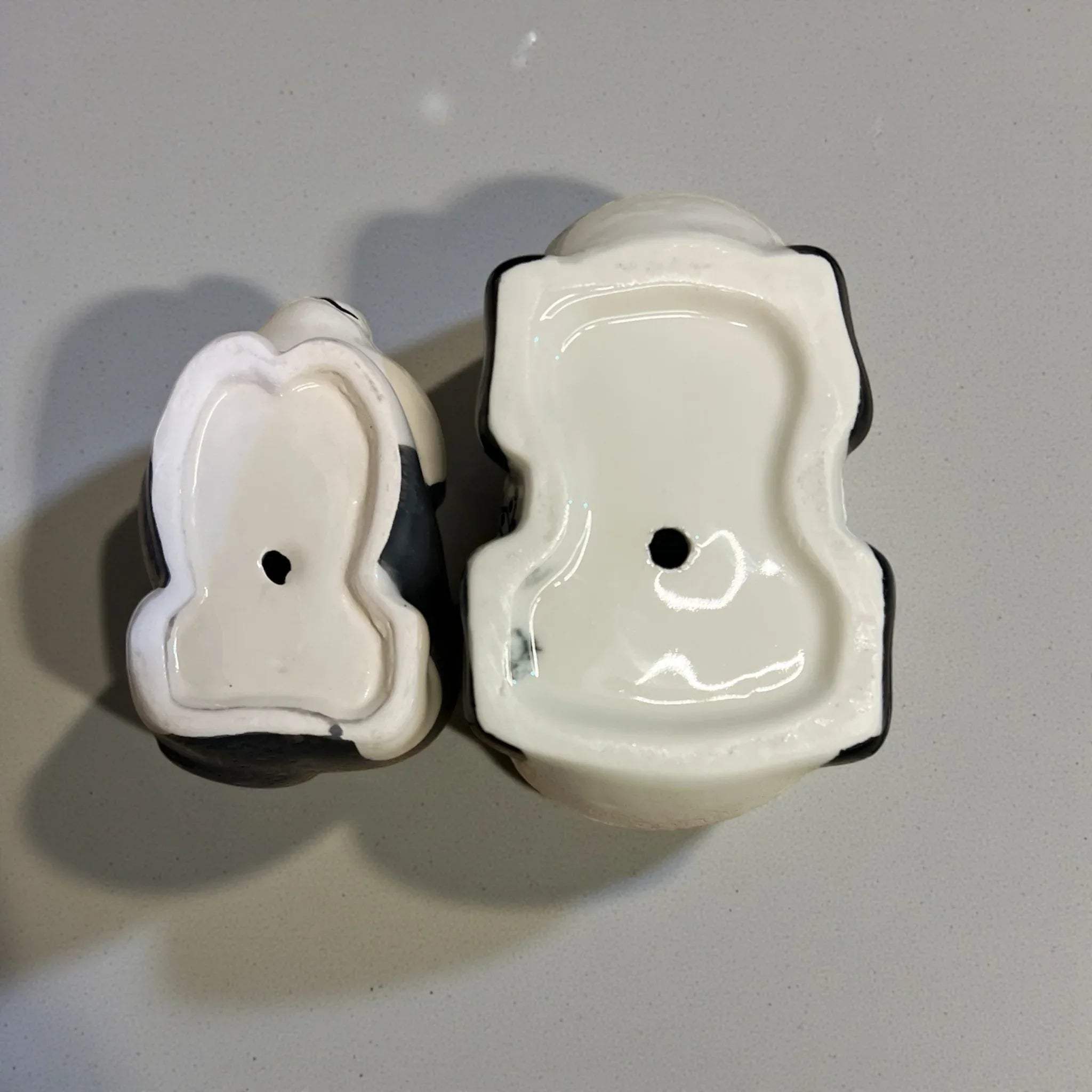 Drainage holes of animal planters; unique birthday gift for nature lovers and aesthetic ceramic decor for plant parents.